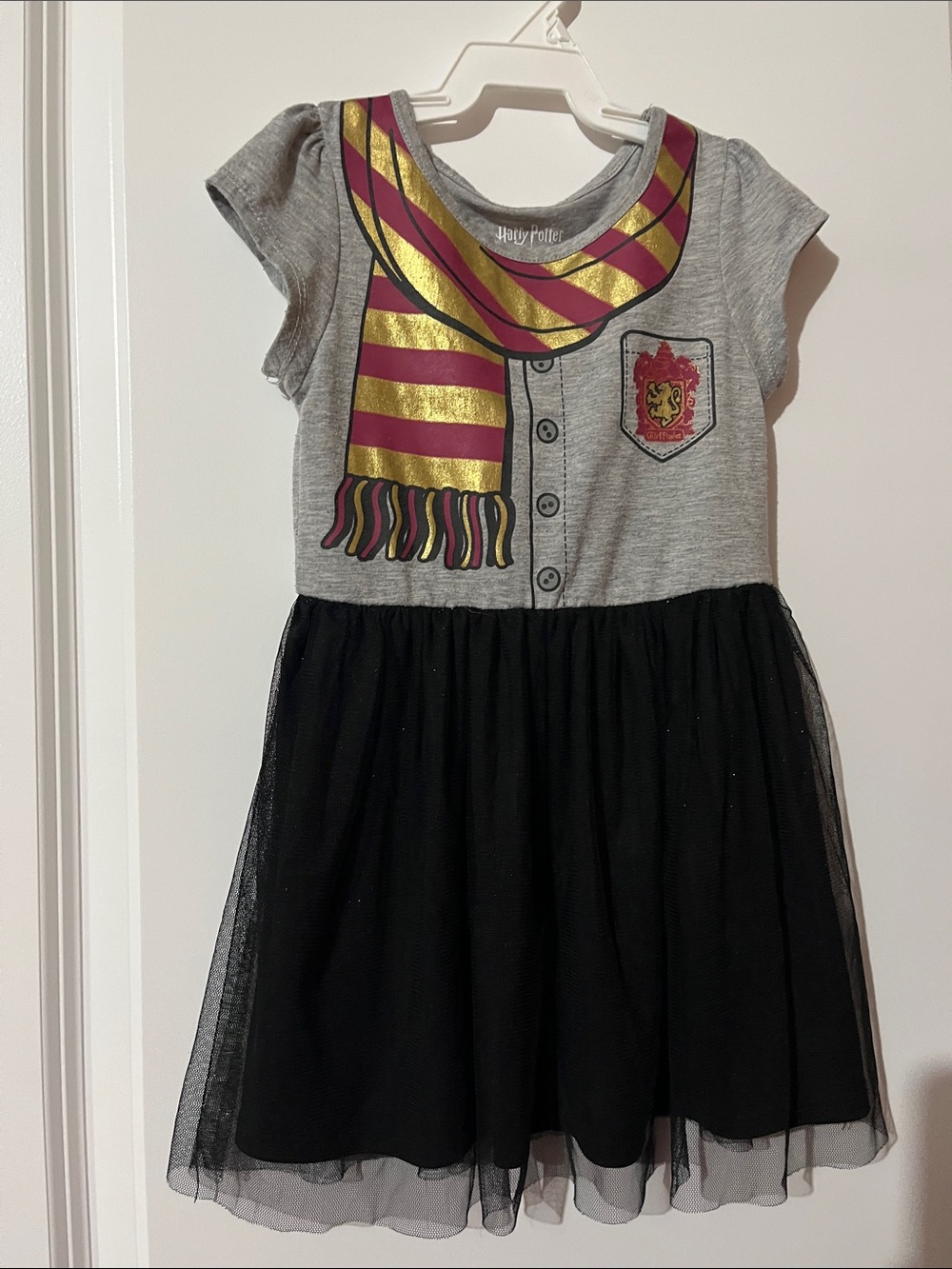 Warner Bros. Gray Tee with Gold and Maroon Stripes